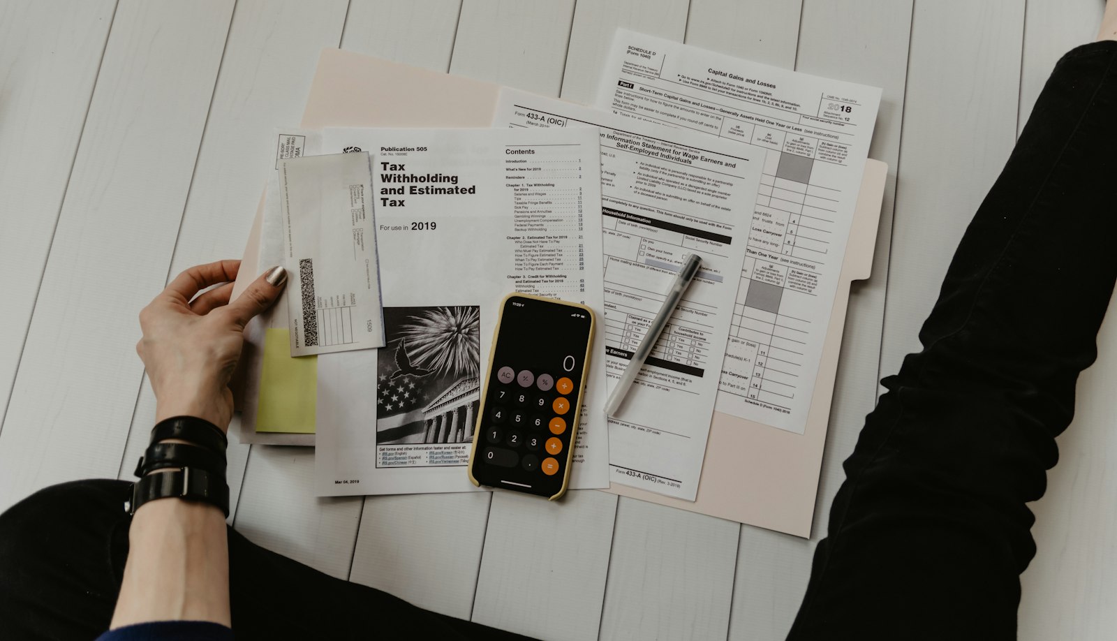Calculator and paperwork on a desk